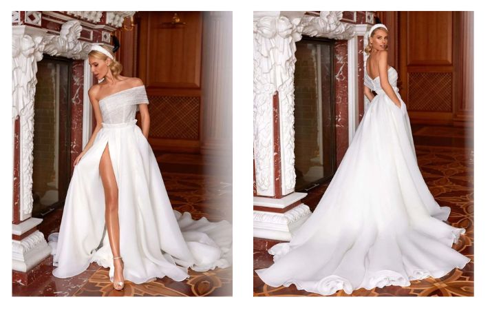  Wedding dress with asymmetrical neckline and side slit
