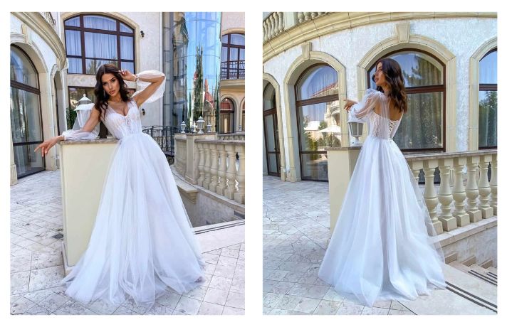 Long wedding dress with layers of tulle and long open chiffon sleeves